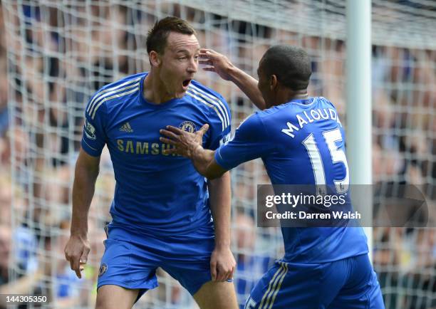 John Terry of Chelsea celebrates scoring their first goal with Florent Malouda during the Barclays Premier League match between Chelsea and Blackburn...