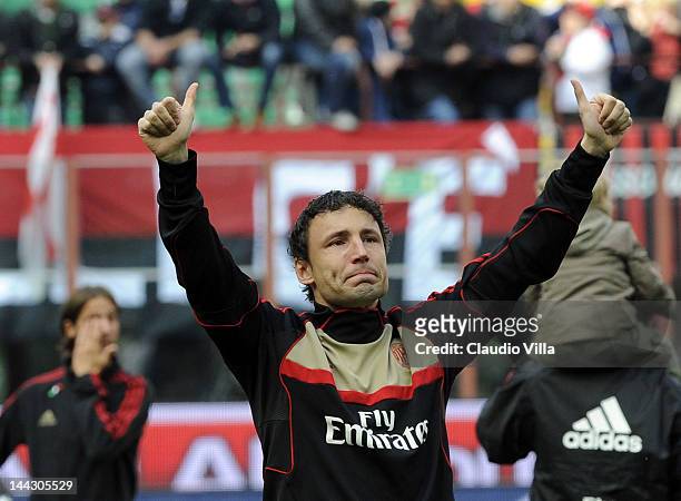 Mark Van Bommel of AC Milan salutes the fans after his last game for AC Milan after the Serie A match between AC Milan and Novara Calcio at Stadio...