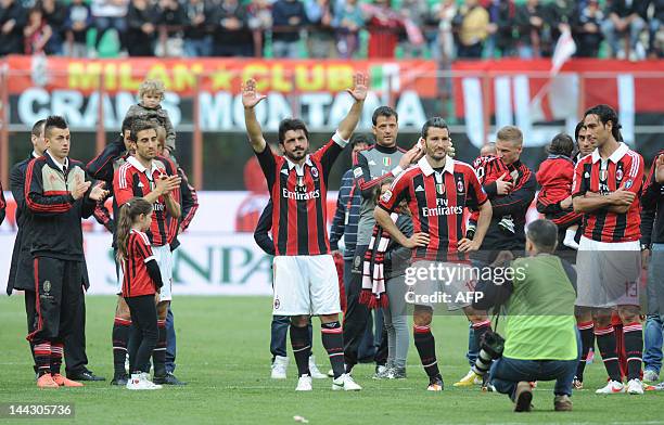 Milan's Gennaro Gattuso, Gianluca Zambrotta and Alessandro Nesta celebrate on the pitch at the end of the Italian Serie A football match between AC...