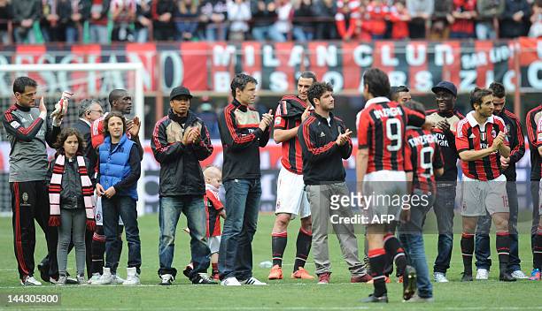 Milan's Filippo Inzaghi celebrates on the pitch at the end of the Italian Serie A football match between AC Milan vs Novara on May 13, 2012 in Milan....