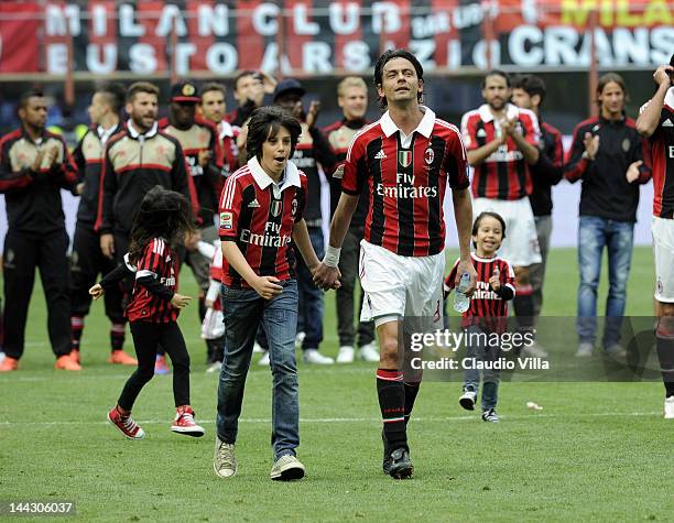 Filippo Inzaghi of AC Milan and his nephew Tommaso Inzaghi salute the audience after his last game for AC Milan during the Serie A match between AC...