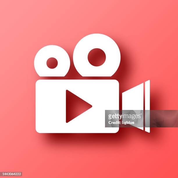 video camera. icon on red background with shadow - television camera stock illustrations
