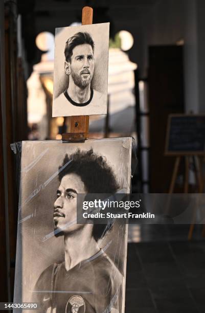 Portrait of Lionel Messi of Argentina and Mo Salah of Egypt are seen at the Souq ahead of the FIFA World Cup Qatar 2022 at on November 20, 2022 in...