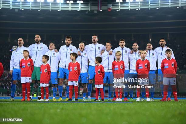 Players of Italy line up during National Anthems prior to kick off of the friendly match between Austria and Italy at Ernst Happel Stadion on...