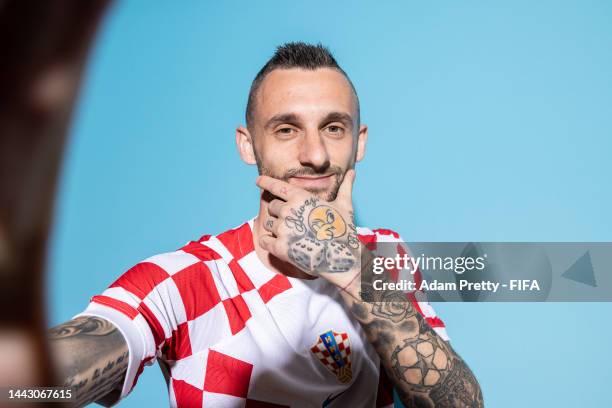 Marcelo Brozovic of Croatia poses during the official FIFA World Cup Qatar 2022 portrait session on November 19, 2022 in Doha, Qatar.