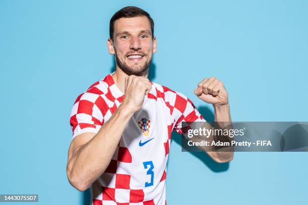 Borna Barisic of Croatia poses during the official FIFA World Cup Qatar 2022 portrait session on November 19, 2022 in Doha, Qatar.
