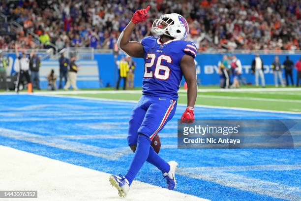 Devin Singletary of the Buffalo Bills celebrates after scoring a touchdown during the third quarter against the Cleveland Browns at Ford Field on...