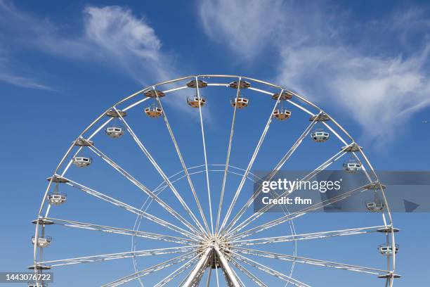 large ferris wheel with blue sky - ferris wheel stock pictures, royalty-free photos & images