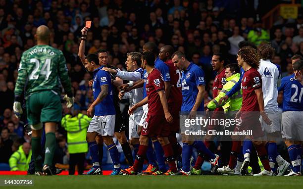 Gary Cahill of Evertonis shown the red card at the end of the match by referee Mr Andre Marriner during the Barclays Premier League match between...