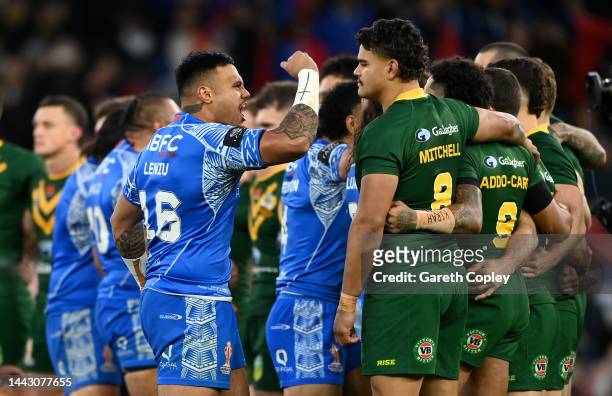 Spencer Leniu of Samoa faces Latrell Mitchell of Australia during the Siva Tau prior to the Rugby League World Cup Final match between Australia and...