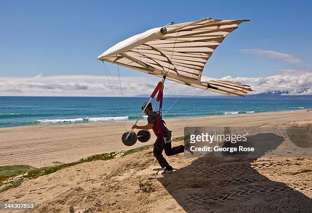 Hang glider takes off from a bluff at Dockweiler State Beach in El Segundo on April 26, 2012 in Los Angeles, California. Millions of tourists flock...