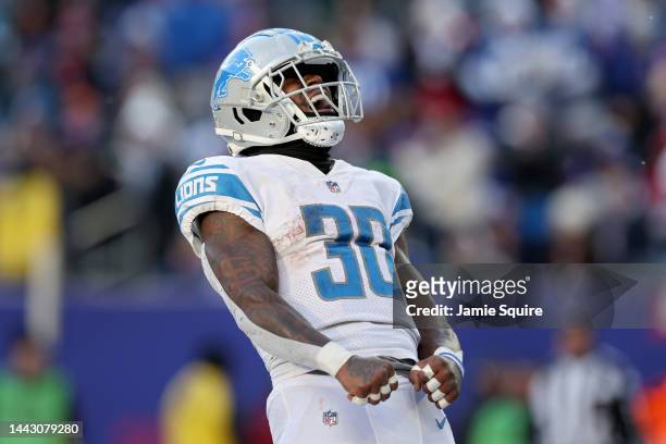 Jamaal Williams of the Detroit Lions celebrates after scoring a touchdown against the New York Giants during the third quarter at MetLife Stadium on...