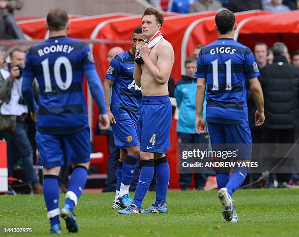 Manchester United's English defender Phil Jones reacts after the English Premier League football match between Sunderland and Manchester United at...