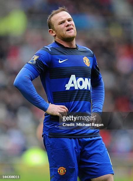 Wayne Rooney of Manchester United looks dejected during the Barclays Premier League match between Sunderland and Manchester United at the Stadium of...