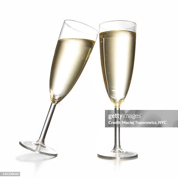 two glasses with champagne. - champagne flute white background stock pictures, royalty-free photos & images