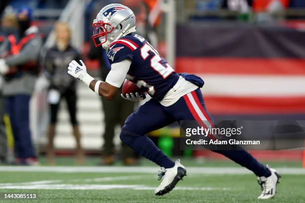 Marcus Jones of the New England Patriots scores a touchdown against the New York Jets during the fourth quarter at Gillette Stadium on November 20,...