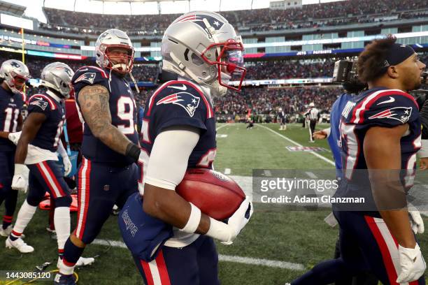 Marcus Jones of the New England Patriots celebrates after scoring a touchdown against the New York Jets during the fourth quarter at Gillette Stadium...