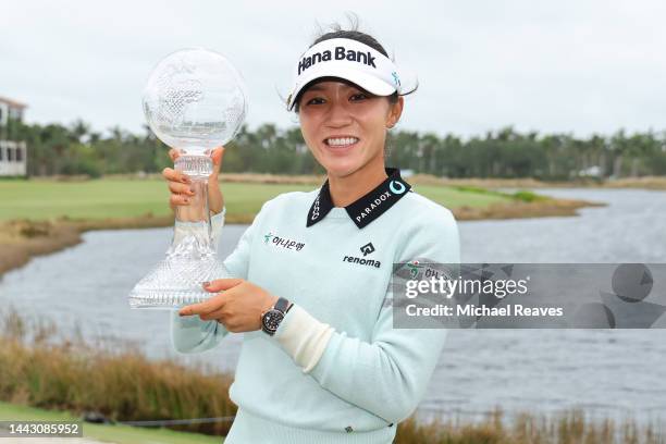 Lydia Ko of New Zealand poses with the trophy after winning the CME Group Tour Championship at Tiburon Golf Club on November 20, 2022 in Naples,...