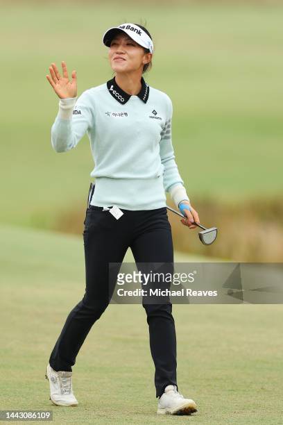 Lydia Ko of New Zealand waves to fans as she approaches the 18th green during the final round of the CME Group Tour Championship at Tiburon Golf Club...