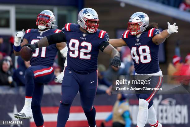 Davon Godchaux of the New England Patriots celebrates after a sack against the New York Jets during the fourth quarter at Gillette Stadium on...