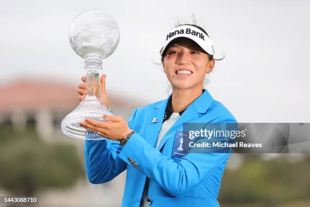 Lydia Ko of New Zealand poses with the CME Globe trophy after winning the CME Group Tour Championship at Tiburon Golf Club on November 20, 2022 in...