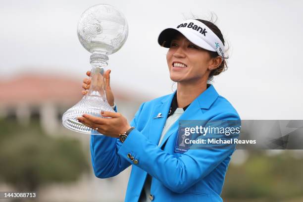 Lydia Ko of New Zealand poses with the CME Globe trophy after winning the CME Group Tour Championship at Tiburon Golf Club on November 20, 2022 in...