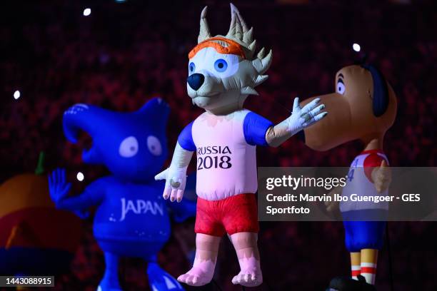 The mascots of ther former World Cups are seen prior to the opening ceremony, here Zabivaka, the Mascot of Russia 2018 prior to the FIFA World Cup...