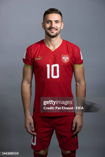 Dusan Tadic of Serbia poses during the official FIFA World Cup Qatar 2022 portrait session on November 20, 2022 in Doha, Qatar.