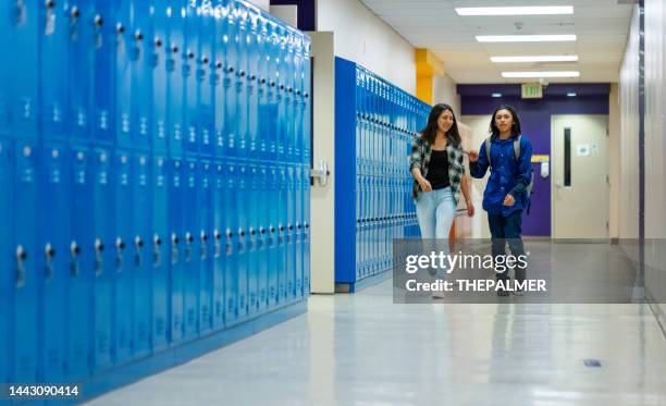 students getting put of the classroom walking on a corridor - heritage hall stock pictures, royalty-free photos & images