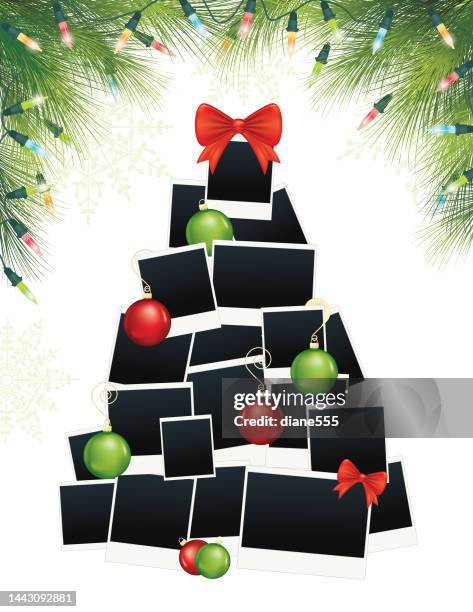 christmas lights photo tree border frame background - christmas picture frame stock illustrations