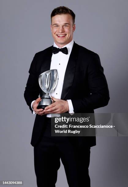 Josh van der Flier of Ireland winner of the World Rugby Men’s 15s Player of the Year in partnership with Mastercard poses with their trophy during...