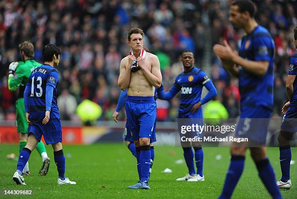 Phil Jones of Manchester United looks dejected during the Barclays Premier League match between Sunderland and Manchester United at the Stadium of...