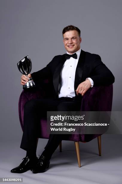 Josh van der Flier of Ireland winner of the World Rugby Men’s 15s Player of the Year in partnership with Mastercard poses with their trophy during...
