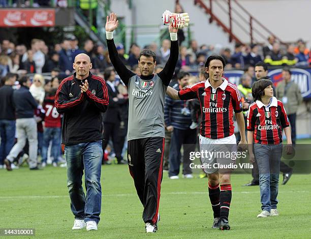 Flavio Roma of AC Milan salutes the fans after his last game for AC Milan after the Serie A match between AC Milan and Novara Calcio at Stadio...