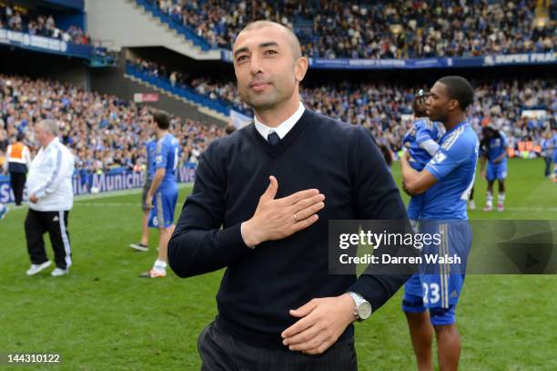 Roberto Di Matteo caretaker manager of Chelsea applauds the fans during the Barclays Premier League match between Chelsea and Blackburn Rovers at...