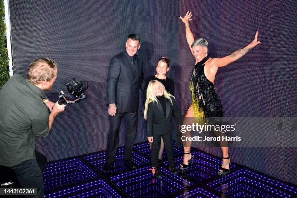 Carey Hart, Willow Sage Hart, Jameson Moon Hart, and P!nk attend the 2022 American Music Awards at Microsoft Theater on November 20, 2022 in Los...