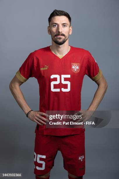 Filip Mladenovic of Serbia poses during the official FIFA World Cup Qatar 2022 portrait session on November 20, 2022 in Doha, Qatar.