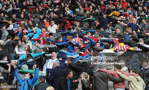 Sunderland fans celebrate a goal by Manchester City by doing a Poznan during the Barclays Premier League match between Sunderland and Manchester...