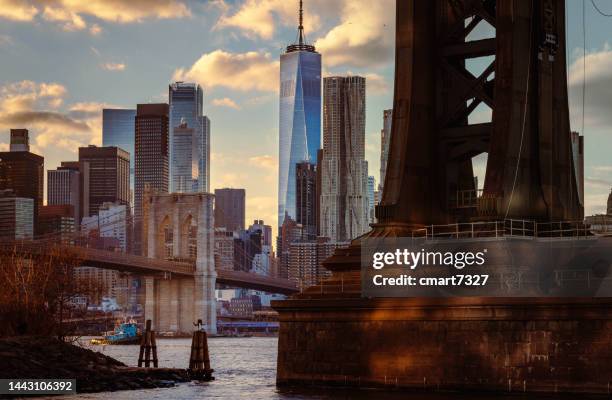the brooklyn bridge, freedom tower and lower manhattan - brooklyn bridge winter stock pictures, royalty-free photos & images