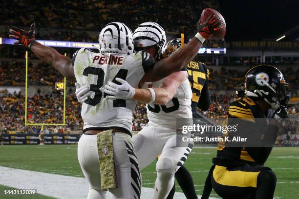 Hayden Hurst of the Cincinnati Bengals celebrates with Samaje Perine of the Cincinnati Bengals after Perine's touchdown during the fourth quarter...