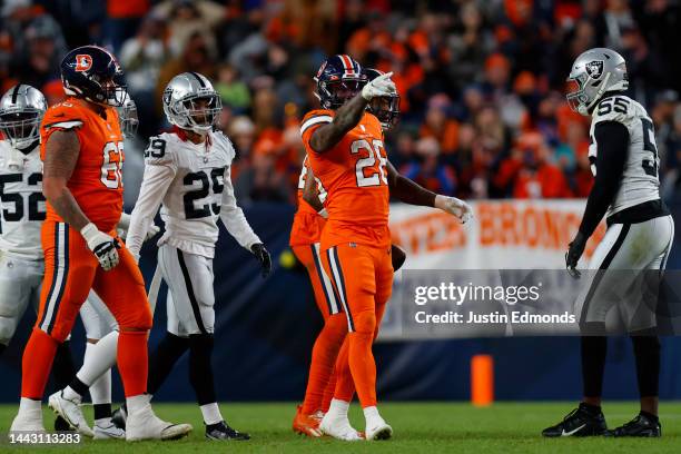 Latavius Murray of the Denver Broncos celebrates a first down in the fourth quarter of a game against the Las Vegas Raiders at Empower Field At Mile...