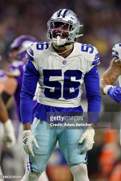 Dante Fowler Jr. #56 of the Dallas Cowboys celebrates after a sack during the third quarter against the Minnesota Vikings at U.S. Bank Stadium on...