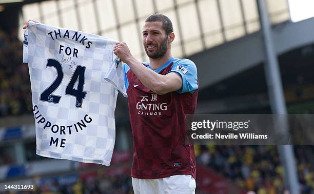 Carlos Cuellar of Aston Villa waves goodbye to the Aston Villa fans after the Barclays Premier League match between Norwich City and Aston Villa at...