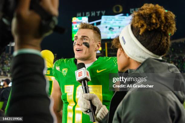 Quarterback Bo Nix of the Oregon Ducks gives an interview after the game against the Utah Utes at Autzen Stadium on November 19, 2022 in Eugene,...