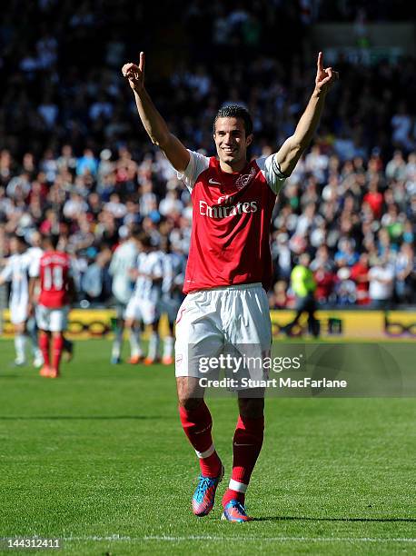 Arsenal captain Robin van Persie celebrates after the Barclays Premier League match between West Bromwich Albion and Arsenal at The Hawthorns on May...