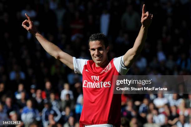 Arsenal captain Robin van Persie celebrates after the Barclays Premier League match between West Bromwich Albion and Arsenal at The Hawthorns on May...