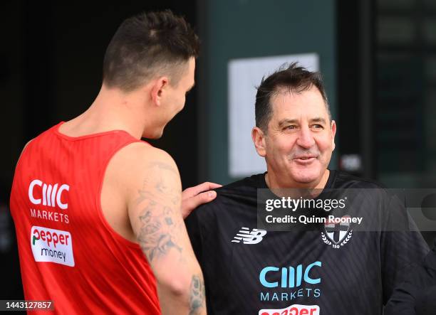 Ross Lyon the coach of the Saints talks to Josh Battle of the Saints during a St Kilda Saints AFL training session at RSEA Park on November 21, 2022...