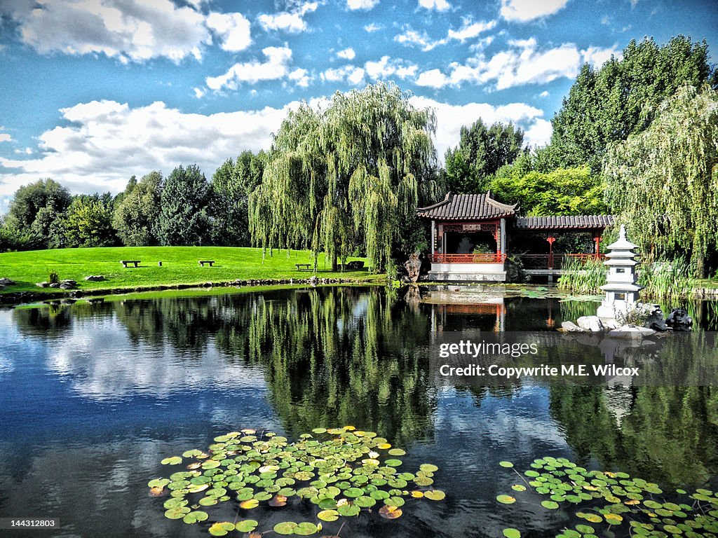 Floating Chinese pavilion on reflecting pond