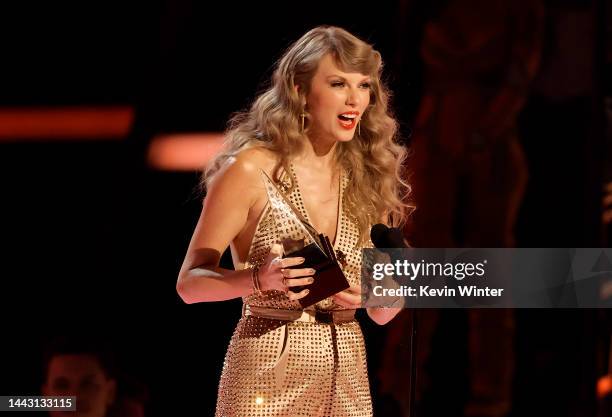 Taylor Swift accepts the Favorite Pop Album award onstage during the 2022 American Music Awards at Microsoft Theater on November 20, 2022 in Los...