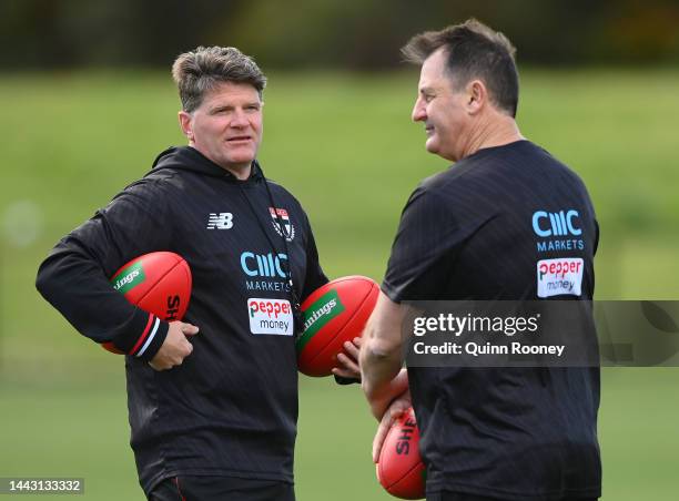 Ross Lyon the coach of the Saints speaks to Robert Harvey the assistant coach during a St Kilda Saints AFL training session at RSEA Park on November...